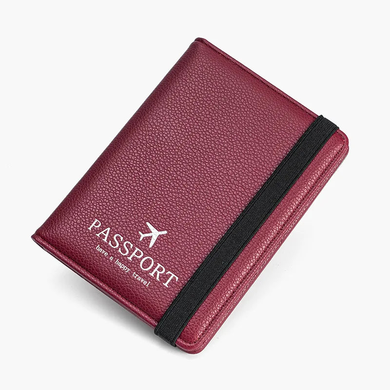 Custodia passaporto in pelle rossa con elastico nero, design elegante, ideale per viaggi, accessori viaggio, protezione documenti, stile moderno.