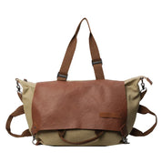 Borsa a tracolla in tela e pelle marrone, design vintage, con manici regolabili e chiusura a zip. Ideale per viaggi e uso quotidiano.