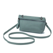 Borsa a tracolla in pelle verde acqua con cerniera frontale, design elegante e minimalista, ideale per moda donna e accessori quotidiani.