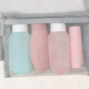 Set da viaggio con flaconi ricaricabili in silicone, colori pastello, in borsa trasparente. Ideale per shampoo, lozioni, cosmetici.