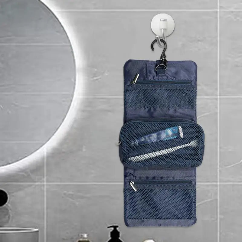 Organizer da viaggio appeso blu con tasche a rete, ideale per articoli da toeletta. Perfetto per bagno, viaggio, accessori organizzati.