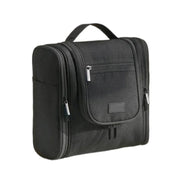 Borsa da viaggio nera con manico, tasche multiple e cerniere. Organizer compatto per articoli da toeletta, ideale per viaggi e spostamenti.