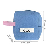 Borsetta cubica in tessuto blu con manico rosa, etichetta "utoo", dimensioni 10,5x9x8 cm. Ideale per cosmetici o piccoli oggetti da viaggio.