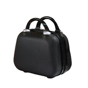 Valigia rigida nera con manici, design compatto, ideale per viaggi brevi. Bagaglio a mano elegante e resistente, perfetto per voli low-cost.