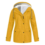 Giacca impermeabile gialla da donna con cappuccio, fodera in pelliccia sintetica, chiusura a bottoni, tasche frontali. Ideale per l'inverno.