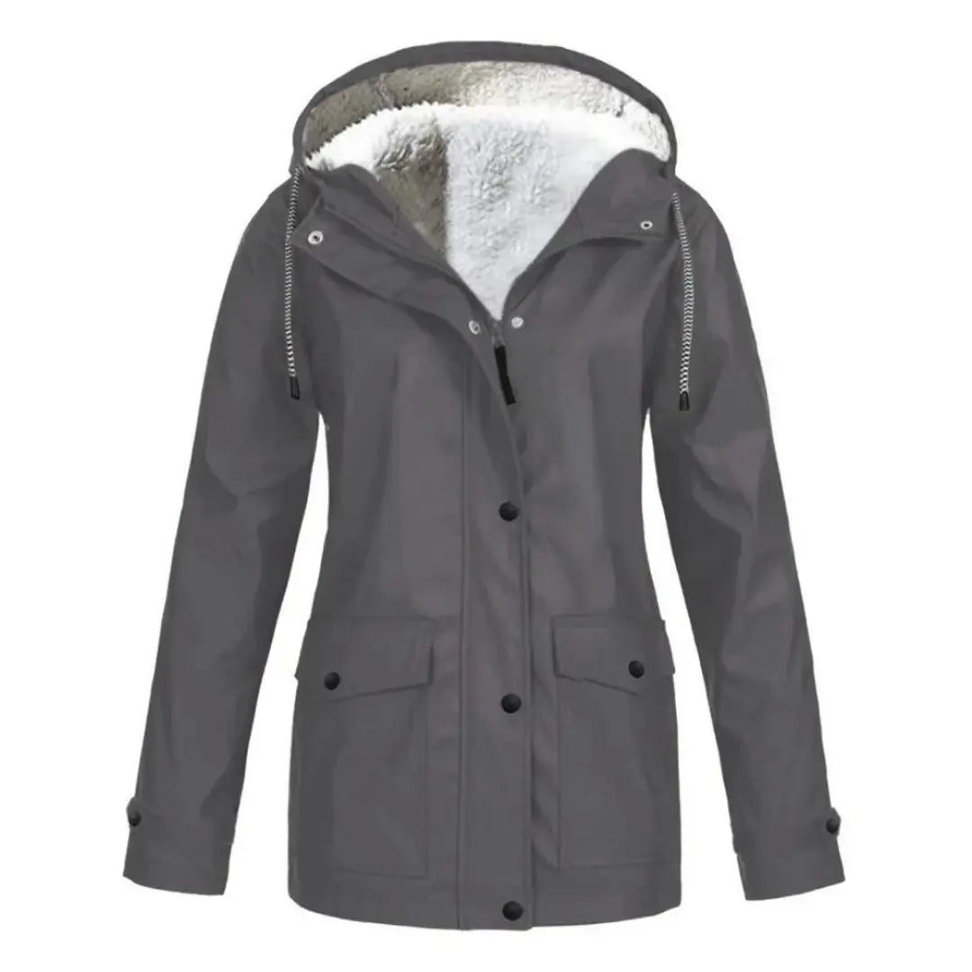 Giacca impermeabile grigia da donna con cappuccio, fodera in pelliccia sintetica, tasche frontali e chiusura a bottoni. Ideale per l'inverno.