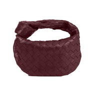 Borsa a mano intrecciata in pelle marrone scuro, design elegante e moderno, accessorio di moda per donna, perfetta per ogni occasione.
