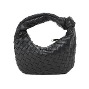 Borsa a mano intrecciata in pelle nera, design moderno, elegante e di lusso. Accessorio moda donna, perfetto per ogni occasione.