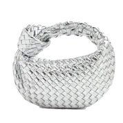 Borsa a mano intrecciata argento, design moderno, accessorio moda donna, elegante e chic, perfetta per eventi serali e occasioni speciali.