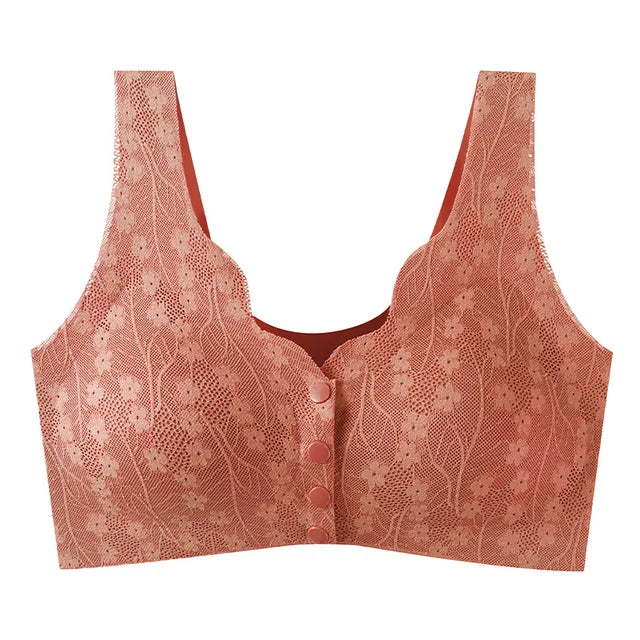 Reggiseno sportivo in pizzo rosa, senza ferretto, con chiusura frontale a bottoni. Design elegante e confortevole per attività sportive.