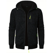 Giacca in pile nero con cappuccio, zip frontale e dettagli giallo neon. Design casual, ideale per l'inverno. Tasche laterali e sul petto.