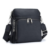 Enhance your style with the chic anti-theft shoulder bag Natalie with fashionable tassel accents