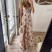 Abito lungo estivo floreale donna, scollo a V, spacco frontale, colore bianco con fiori rossi, perfetto per occasioni casual e serate estive.