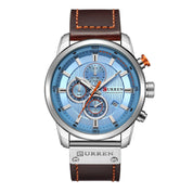 Orologio da polso Curren cronografo, quadrante blu, cinturino in pelle marrone, dettagli in acciaio inox, design elegante e moderno.