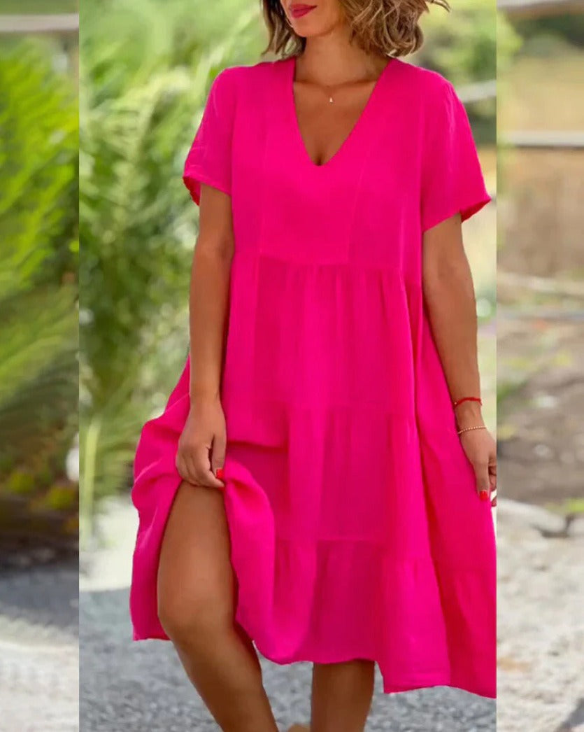 Abito grembiule estivo chic con scollo a V arricciato ed eleganti maniche a pieghe