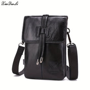 Borsa a tracolla in pelle nera da uomo, design elegante e compatto, con chiusura a cerniera e tracolla regolabile, ideale per uso quotidiano.