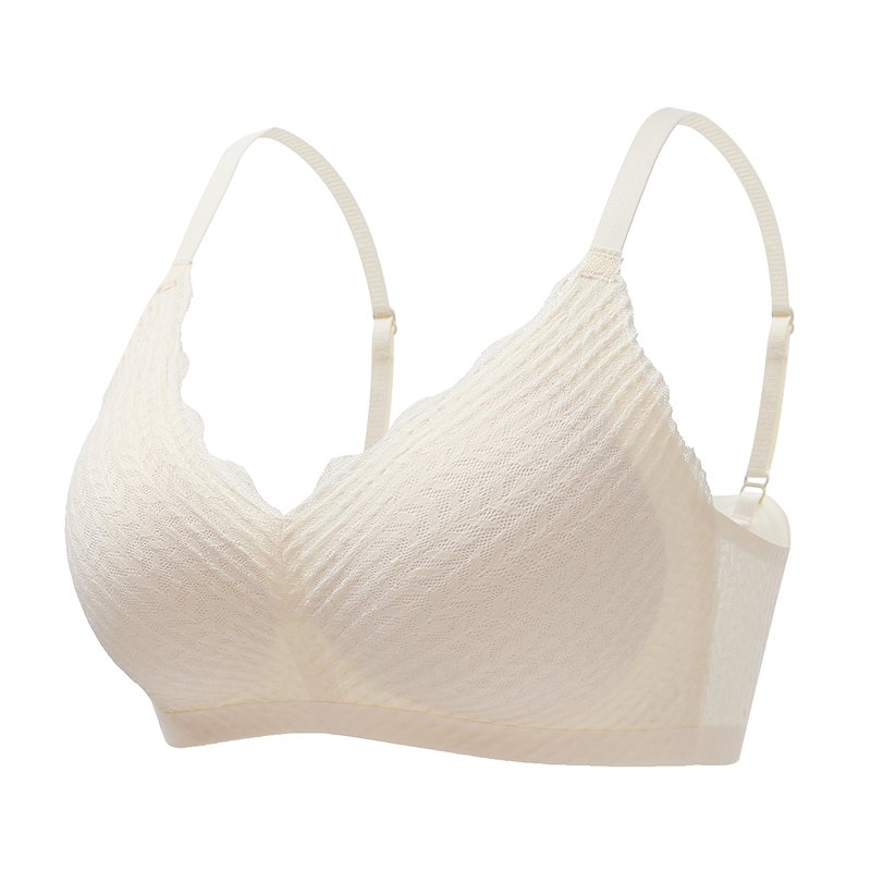 Reggiseno senza cuciture color crema, design a coste, spalline regolabili, comfort quotidiano, intimo donna elegante e morbido.