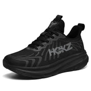 Scarpa da ginnastica nera unisex, design moderno, suola ammortizzata, tomaia traspirante, ideale per corsa e sport, comfort e stile.