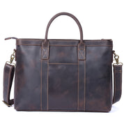 Borsa a tracolla in pelle marrone scuro, design elegante e spazioso, con manici robusti e tracolla regolabile. Ideale per lavoro e viaggio.