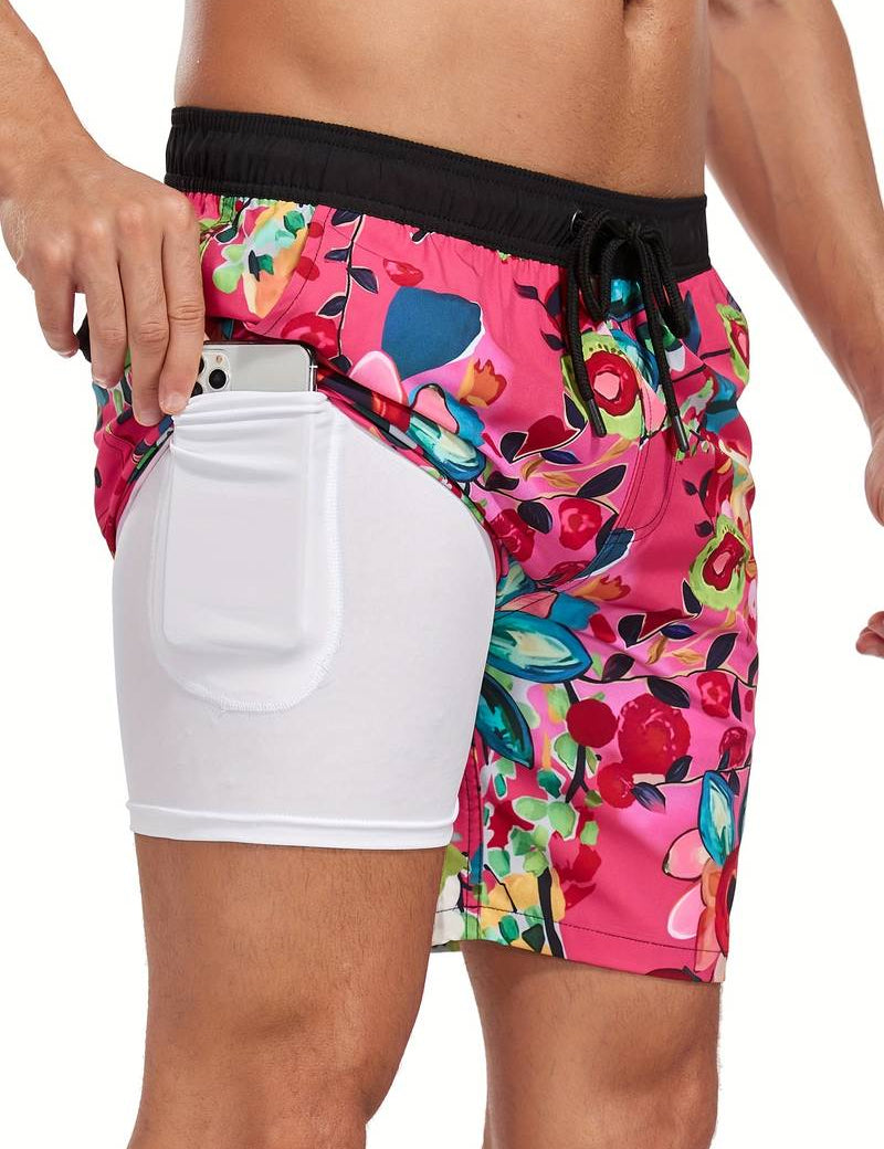 Pantaloncini da uomo con stampa floreale rosa, tasca laterale con cellulare. Design estivo, moda mare, abbigliamento casual.