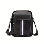 Borsa a tracolla in pelle nera con strisce decorative, tasca frontale con zip, design elegante e moderno, ideale per uomo, accessorio moda.