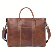 Borsa a tracolla in pelle marrone, design elegante e spazioso, con manici robusti e tracolla regolabile, ideale per lavoro e viaggio.