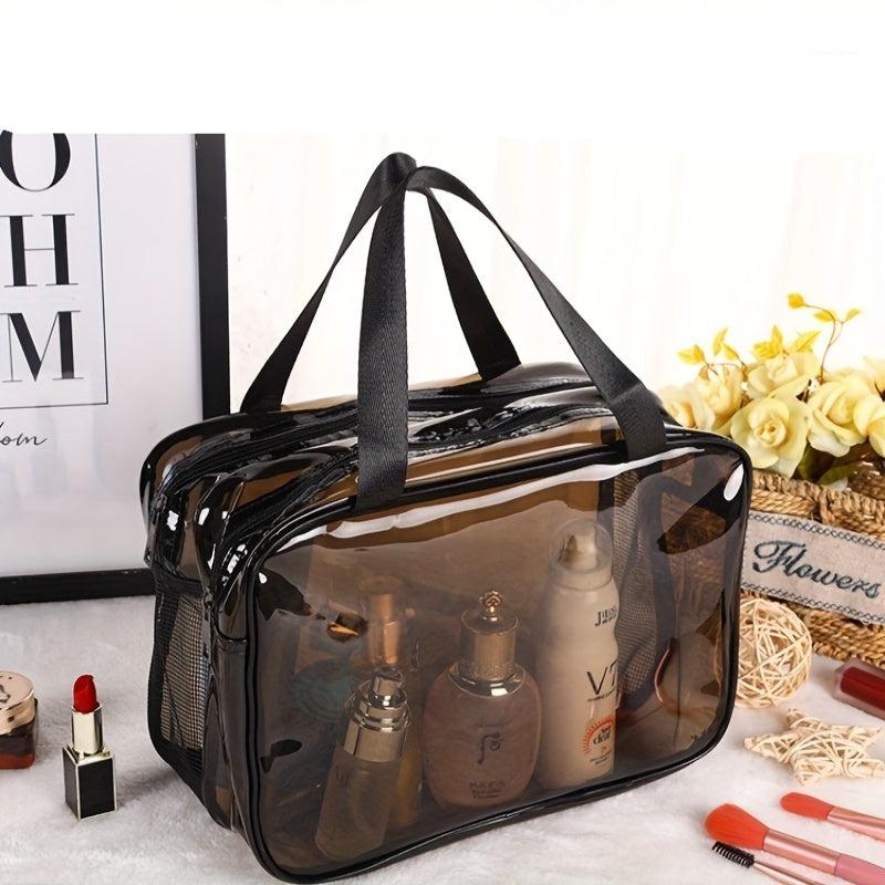 Borsa trasparente in PVC con manici neri, contenente prodotti cosmetici. Ideale per viaggi, organizzazione trucco, accessori bagno.