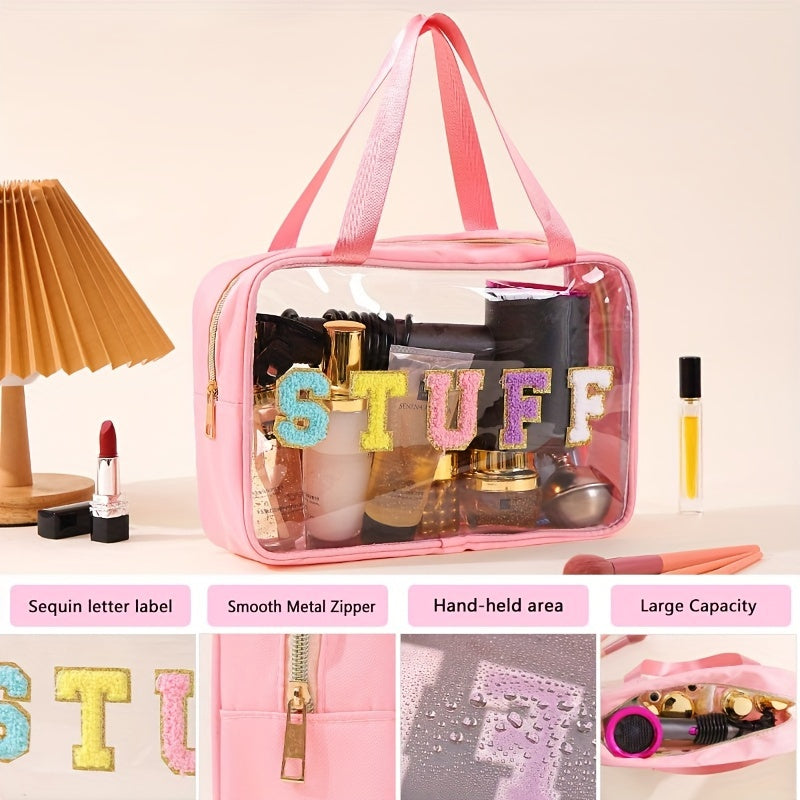 Borsa da trucco trasparente rosa con etichetta "STUFF" in paillettes, cerniera metallica liscia, ampia capacità, ideale per cosmetici e accessori.
