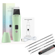 Dispositivo scrubber viso verde con display LED, cavo USB, manuale utente e strumenti per la pulizia della pelle. Ideale per esfoliazione e cura del viso.