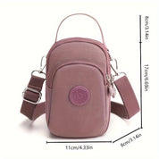 Borsa a tracolla piccola rosa, design compatto, con tasca frontale e cerniera, dimensioni 17x11x8 cm, ideale per donna, moda casual.