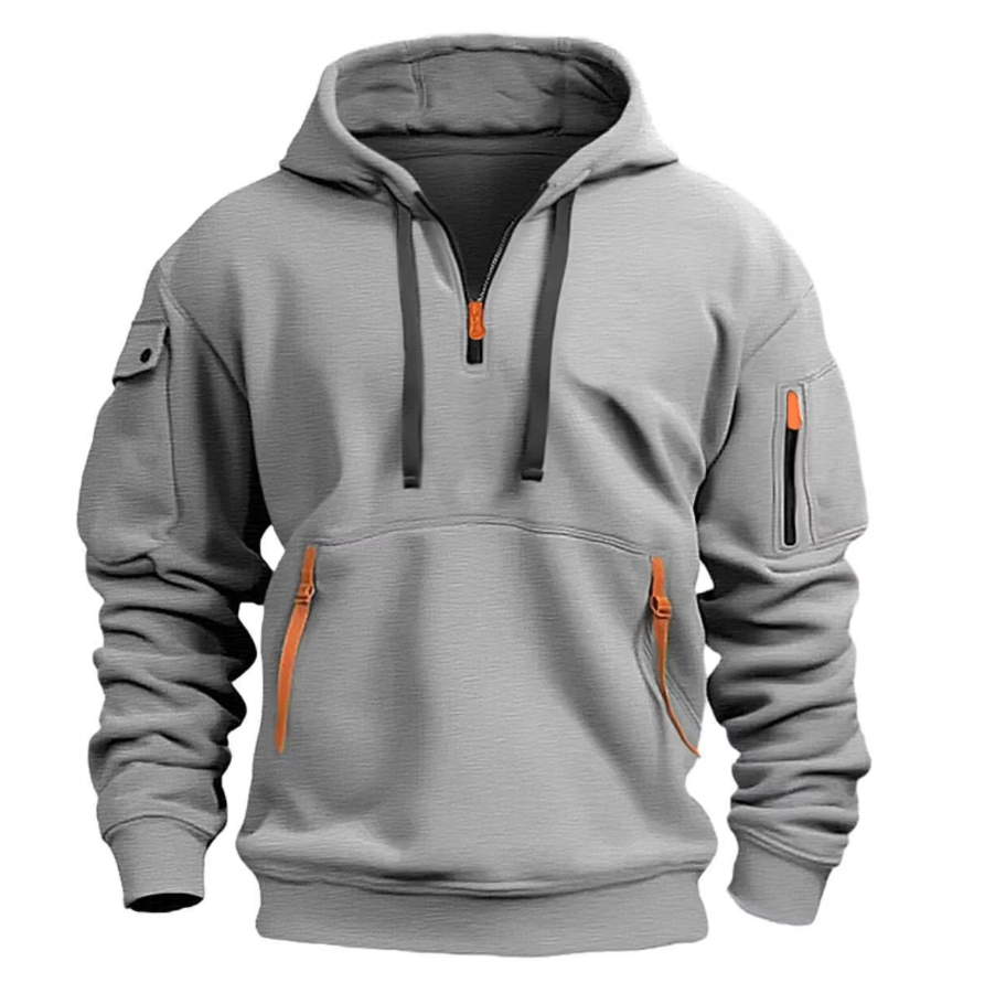 Felpa grigia con cappuccio, zip arancioni, tasche multiple e maniche lunghe. Design casual, ideale per moda uomo autunno-inverno.