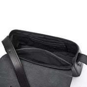 Borsa a tracolla nera in pelle, design elegante, interno spazioso con scomparti per carte. Accessorio moda donna, ideale per ogni occasione.