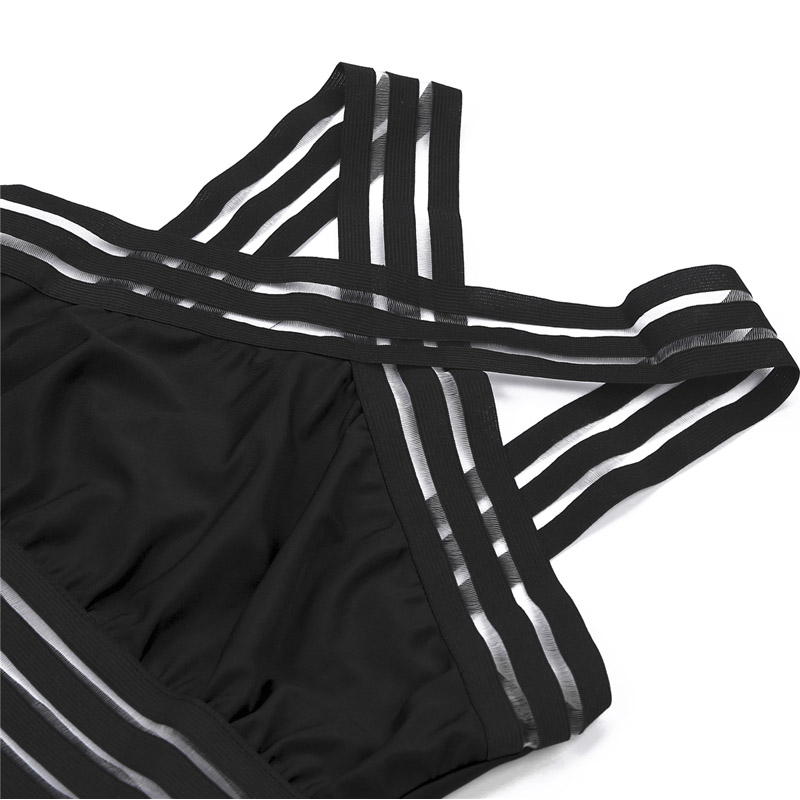 Top sportivo nero con spalline incrociate a righe bianche e nere, design moderno, tessuto elasticizzato, ideale per allenamento e yoga.
