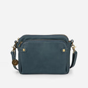 Borsa a tracolla in pelle blu con doppia zip e dettagli in metallo dorato, design elegante e compatto, ideale per moda donna e accessori di lusso.